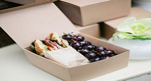 Grapes and sandwich in a box